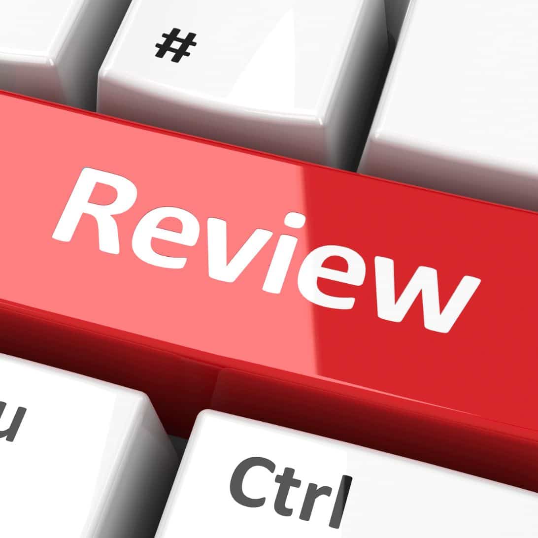 Rode toets met het woord Review