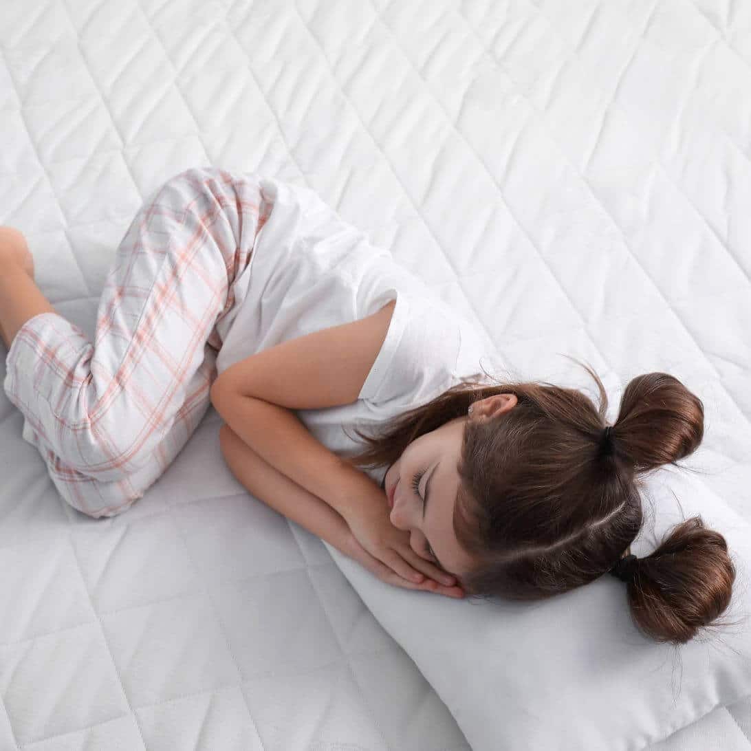 Kind op kindermatras