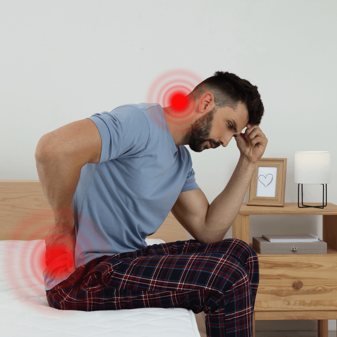 Man die net opgestaan is van zijn bed en heeft last van Fibromyalgie