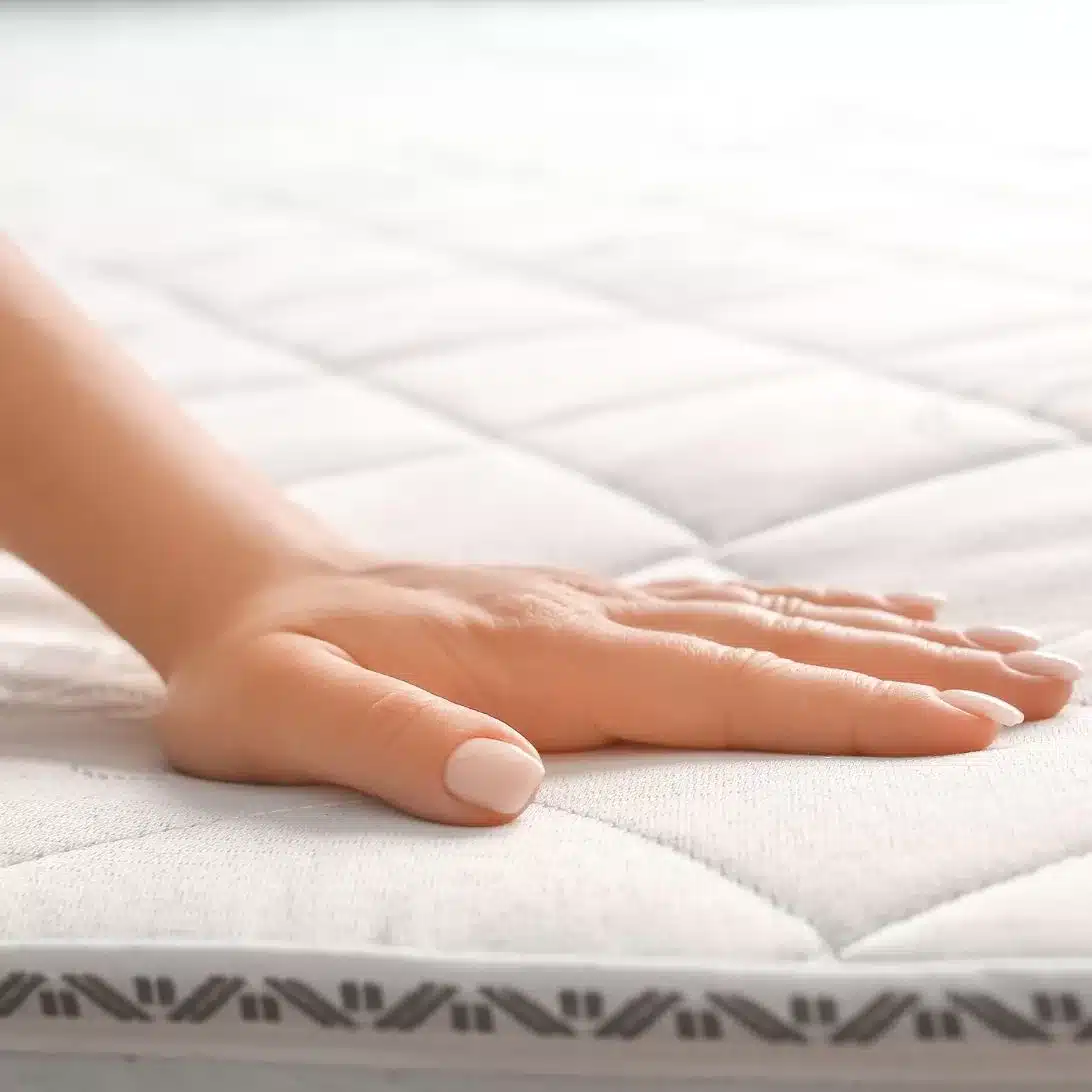 hand op matras