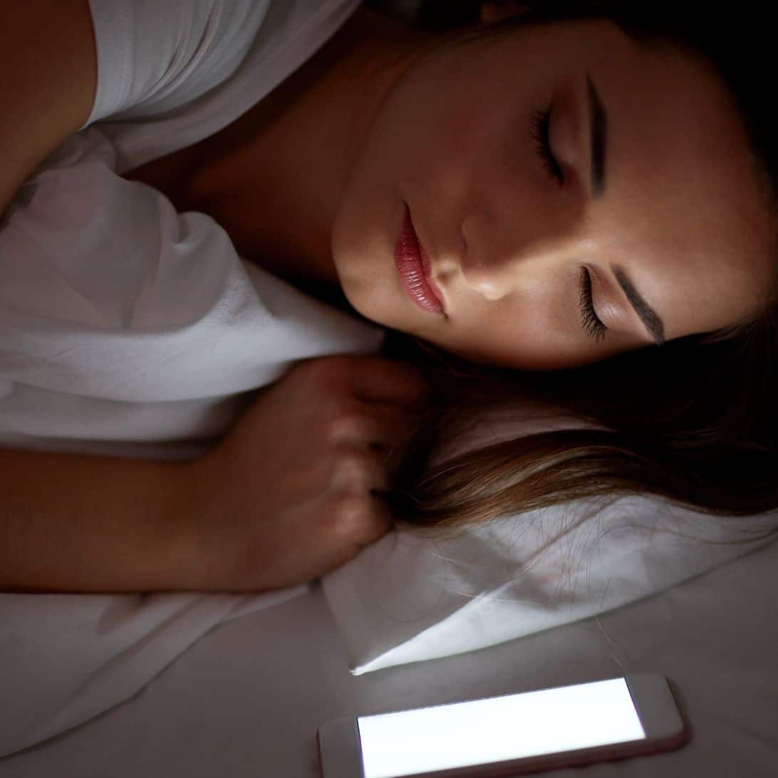 vrouw in bed slaap app